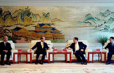 China's top negotiator says interactions with Taiwan remain