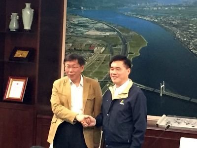 Taipei mayor-elect Ko Wen-je visits Taipei Mayor Hau
