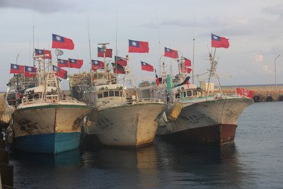 Fishing boats leave Taiping Island