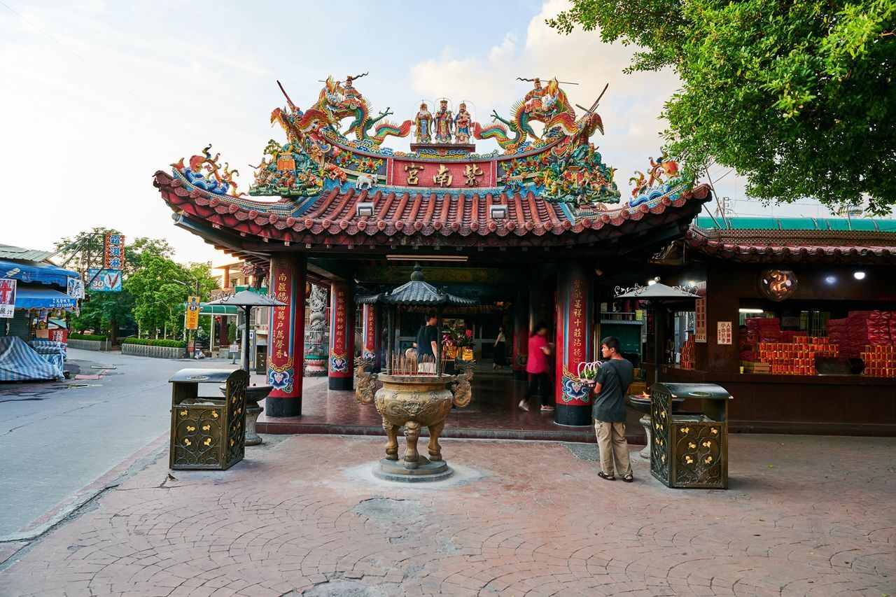 WATCH: Foxconn heads visit temple with golden rooster