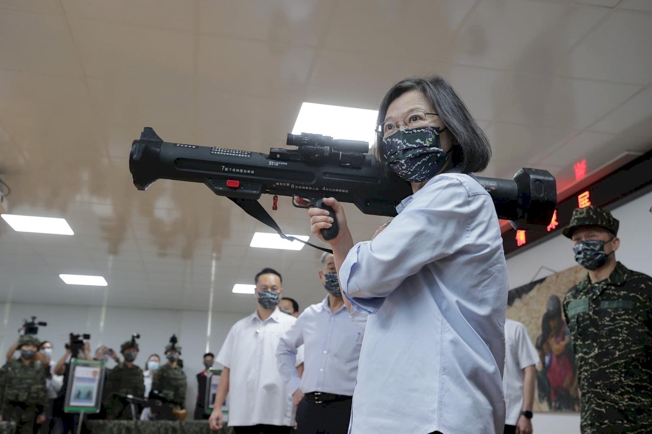Memes with Tsai handling a weapon