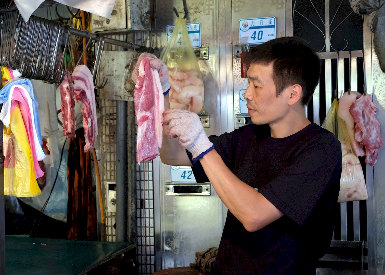 Shopping for produce at a traditional outdoor market in Taipei