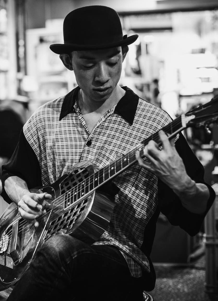 Live blues performance by Yoshi